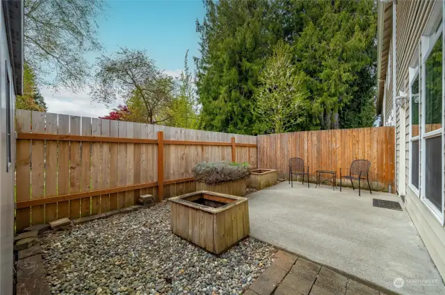 The fully fenced in back patio area is enough space for your BBQ, some small gardening in the raised beds, and a perfect seating area on the back patio. The only thing missing are your twinkle lights!