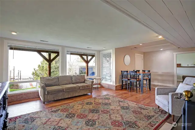 Downstairs living area with oversize windows to take in the views of saratoga passage.