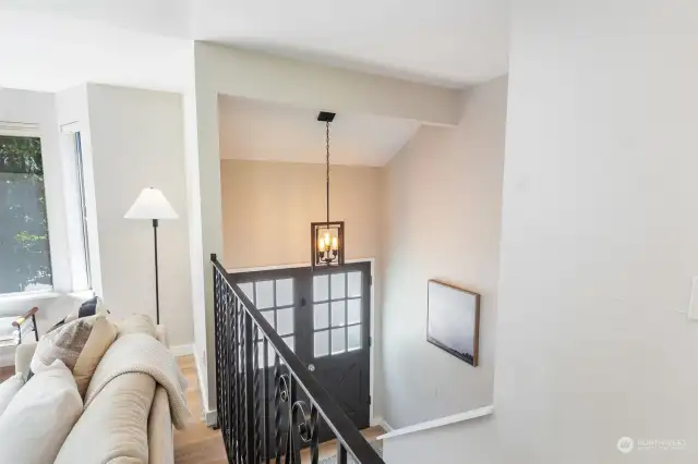 Bright and Airy split level with double doors and gracious entry.