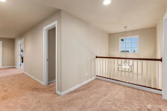 Open to vaulted ceilings above entrance