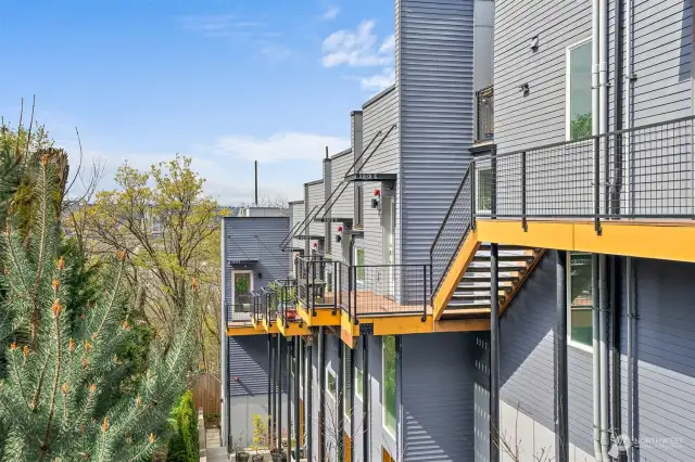 Modern walkway leads from the quiet street to your new home.  Built in 2020, this townhome has all the modern conveniences ideal for contemporary living.