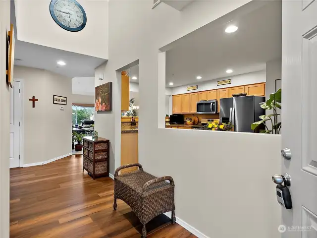 Foyer, family room and kitchen have been updated with beautiful luxury vinyl planked flooring.