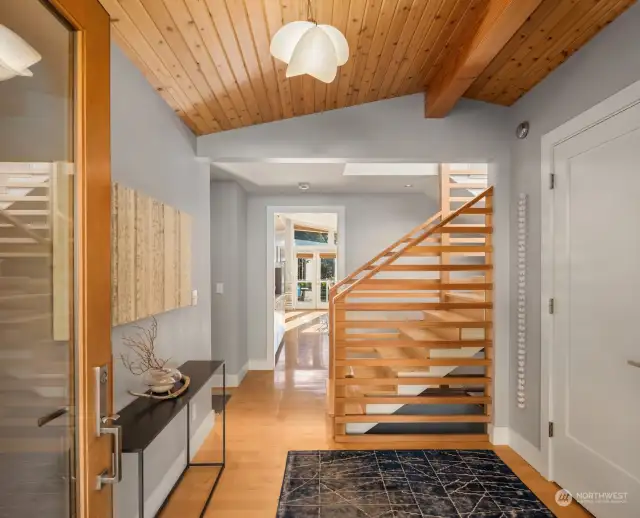 As you walk in, warm wood tones in the floor and ceilings invoke a sense of warmth and clean design.