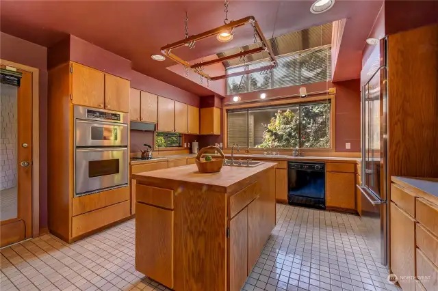 Spacious kitchen with skylight & island