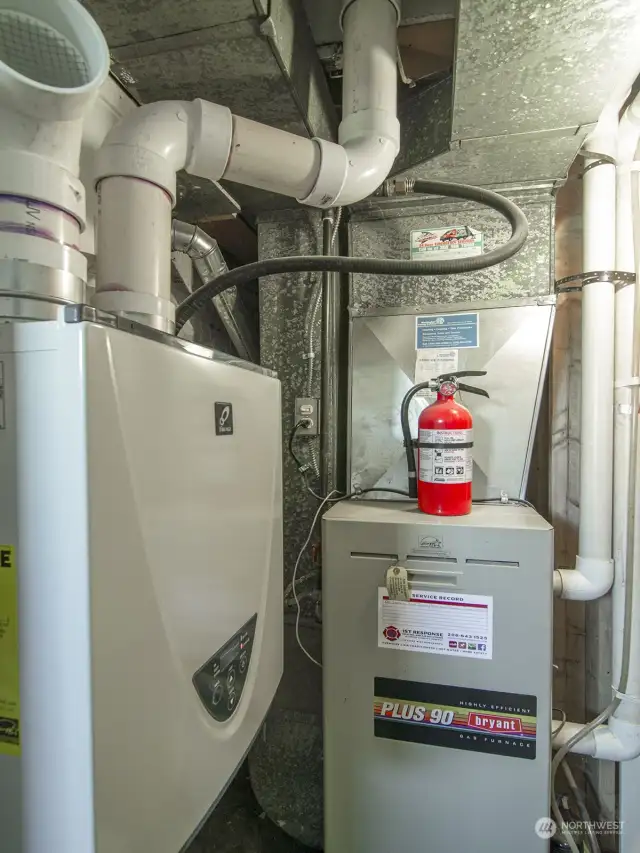High efficiency gas furnace and gas tankless hot water heater.