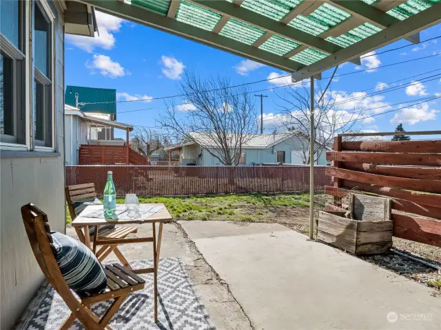 Covered back patio...perfect space for grilling or relaxing.