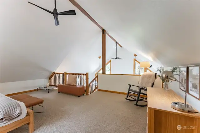 Vaulted ceilings give the loft height