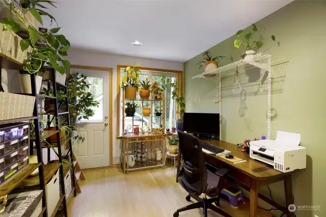 Home office or flex space. The exterior door leads to what could be a roof top deck.