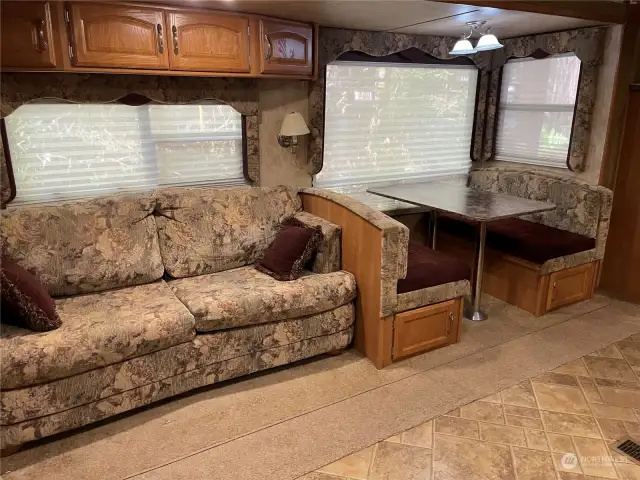 Plenty of room in the trailer for dining, lounging.