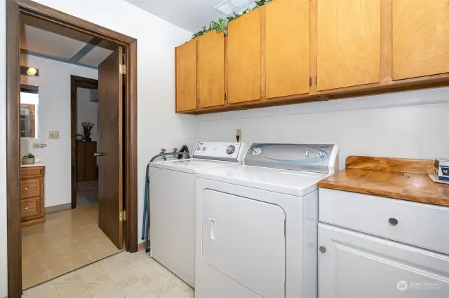 Laundry room near the back door of the home.
