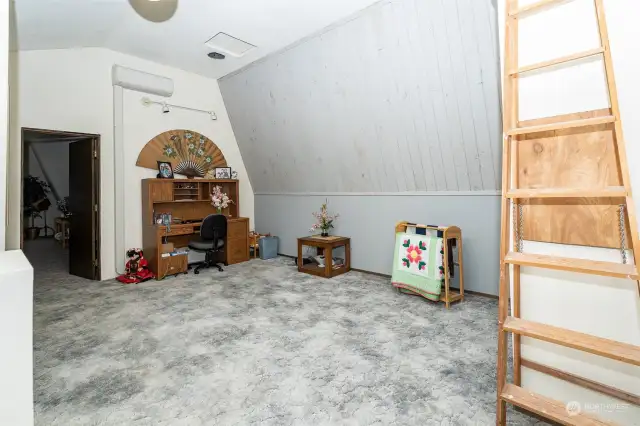 Large room at top of stairs for office, family or play room, view 1.  Has mini-heat pump with heating and cooling capacity.
