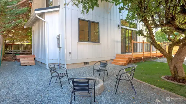 Entertain in your additional outdoor space or simply take in the tranquil surroundings this community has. The steps to the far left lead to your individual storage space.