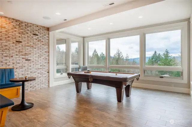 Game room overlooking mountains.