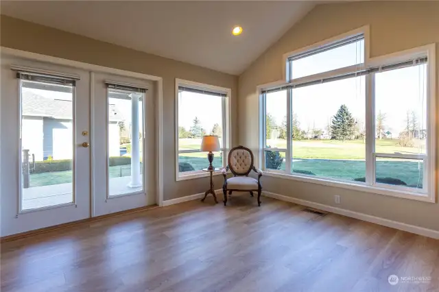 French doors to deck with views of green space, 5th green and mountains!