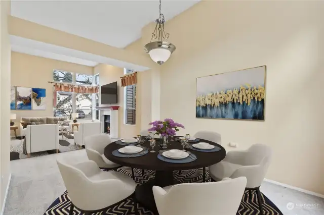 Virtually staged. Formal dining room open to the living room for seamless entertaining.