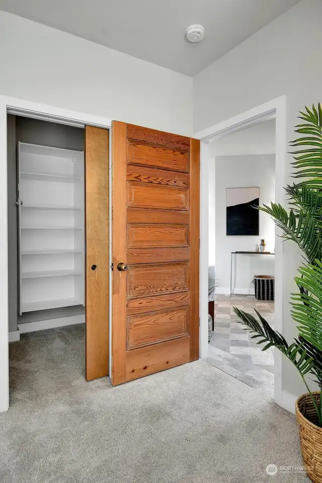 Walk-in closet with built in closet system.