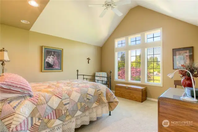 One of three upper level bedrooms. All bedrooms are considerably sized.