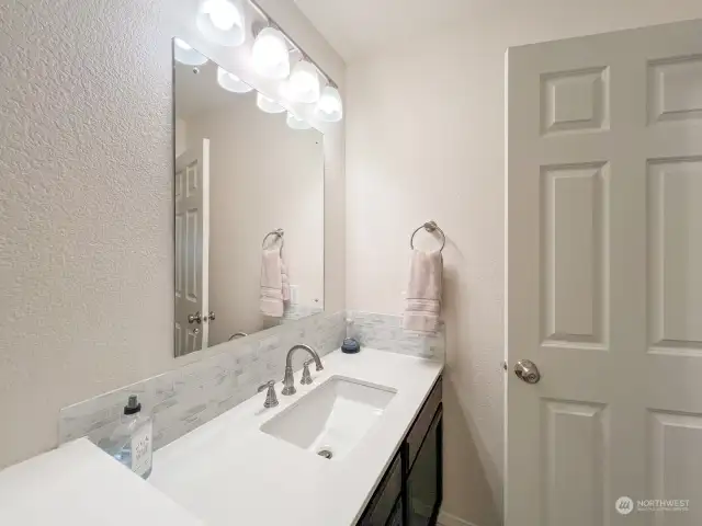 Another view of the roomy powder room