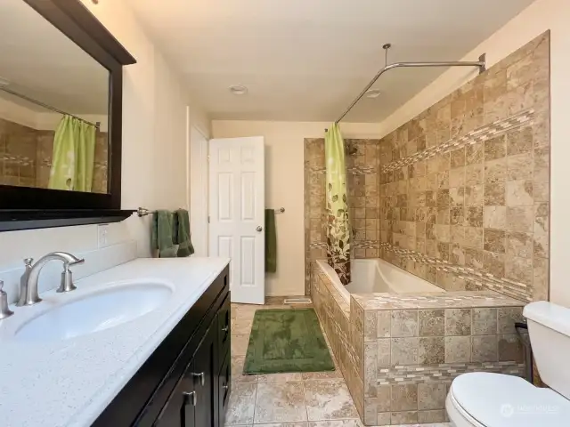 Beautiful 4 piece bathroom with soaking tub