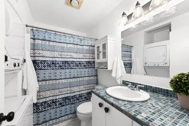Bathroom with stacked washer & dryer