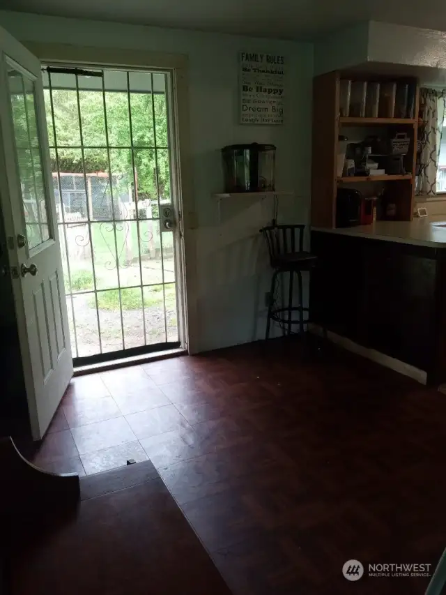 A great space for a dining table off the family and kitchen area. Door to the outside patio area.