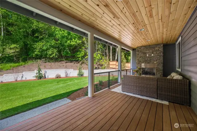 Covered back deck with outdoor fireplace