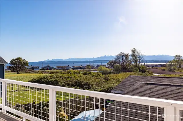 Imagine waking up and walking out on your deck without leaving your bedroom. Soak up the sun and these expansive views of shipping lanes, gorgeous mountains, and ever-changing skylines.