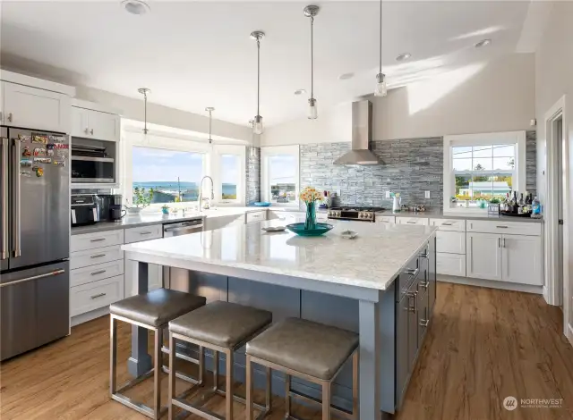 Get ready to be wowed by the custom island in this breathtaking kitchen. There's plenty of counter space to set out food for your guests or lay out the ingredients for cooking! Also room for more cooks in the kitchen,
