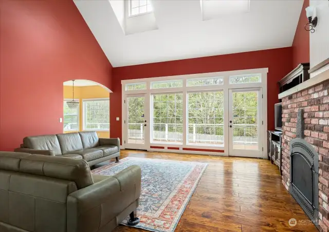 Great room windows flood the home with natural light