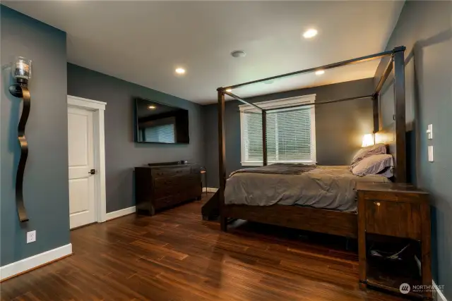 Primary bedroom with 5 piece spa bathroom.  Spacious walk-in closet off primary offers ample space for your needs.