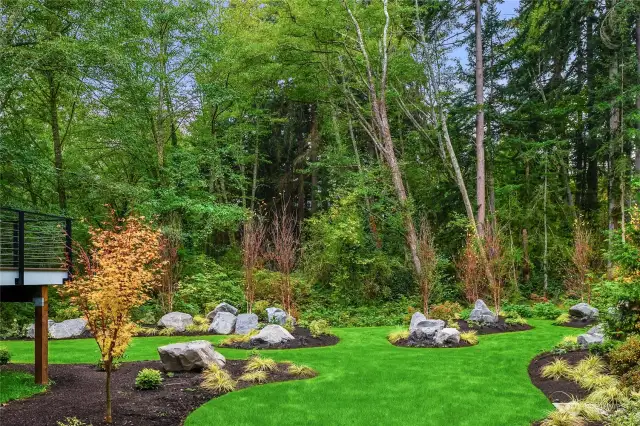Lush landscaping surrounds this property  making it feel like your own personal park.