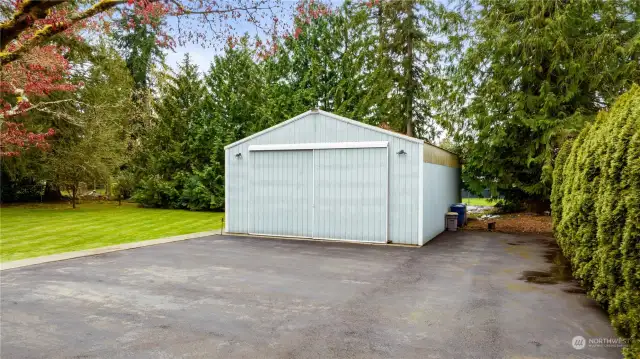 Huge detached garage in back is approximately 950sf per seller.  Parking for boat, RV, etc, plus large heated office or studio space inside the garage.