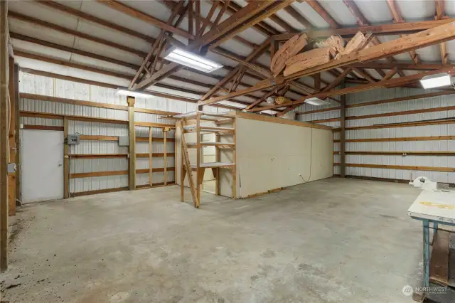 Mega-large detached garage/workshop in back.  Per seller it is around 950sf and has a heated office space.  So much potential for it's utilization!