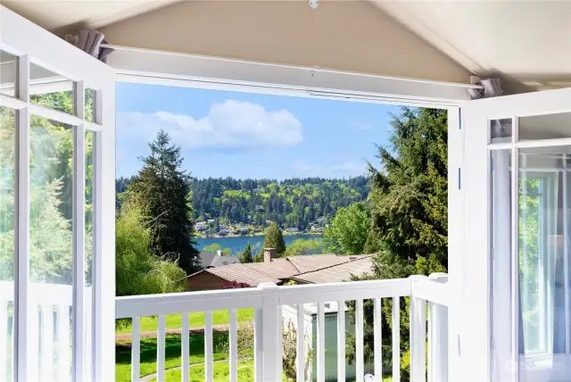 Bedroom Private balcony with views of Lake Washington.