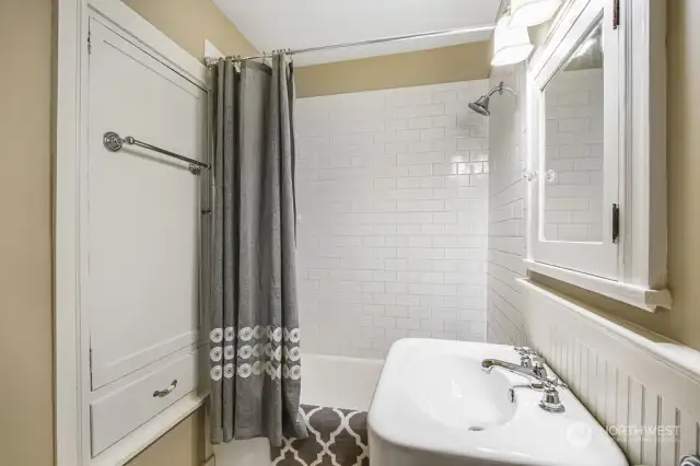 It includes bead board wainscoting and stunning marble floor tile.
