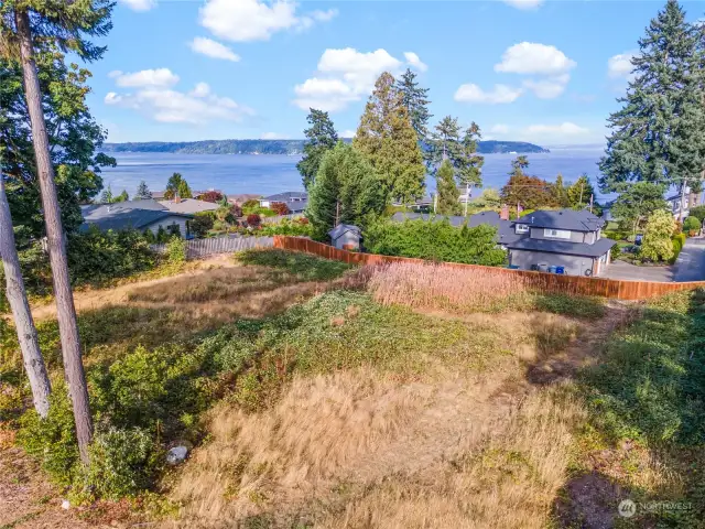 This view lot has sewer, water and gas in the street.  It is fenced on three sides and can be as private as you'd like.  Here's your opportunity to secure a Gig Harbor lot for your future dreams.