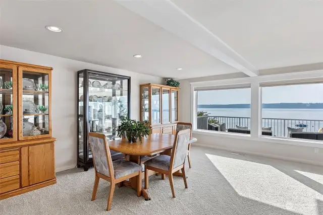 Easily flow from the waterside dining room to the spacious living room adjacent.