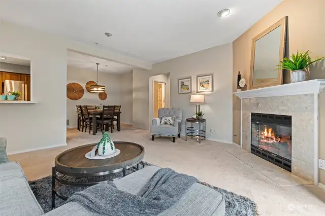 Living Room with Formal Dining Area and Natural Gas Fireplace