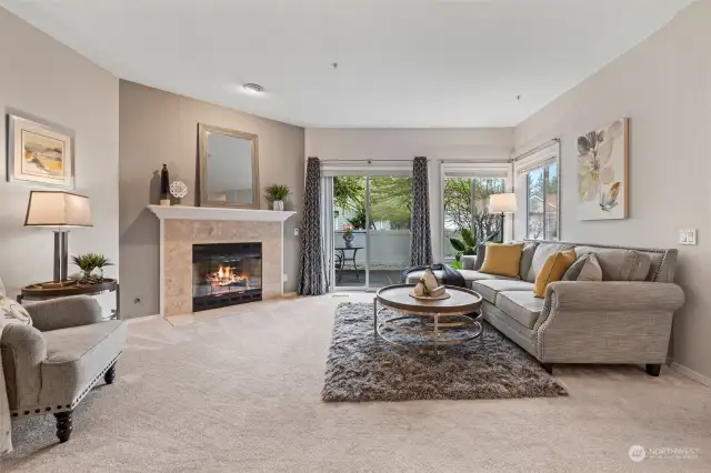 Main Living Area with Natural Gas Fireplace and Slider to Garden Patio