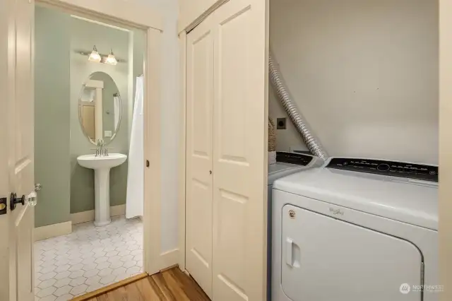 The full-size washer and dryer closet is conveniently situated in the hall, providing easy access for both bedrooms, making laundry a breeze.