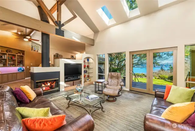 Wow!  Once inside the home you’ll be greeting with stunning views from the numerous windows and skylights.  Natural light floods this home with sunshine and warmth.