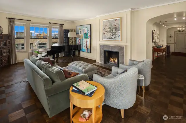 Featuring a spacious living room anchored by a wood burning fireplace.