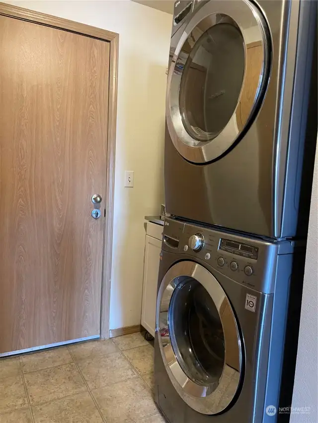 Stainless stackable washer and dryer.