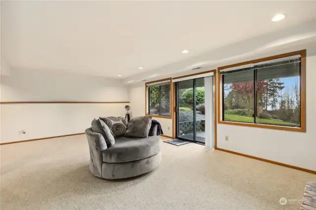 This large room in the lower level is great for hanging out or entertaining.