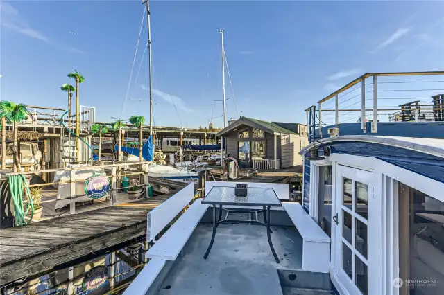 Great space to enjoy entertaining your guests, game time or dining on the East side of the houseboat entry.