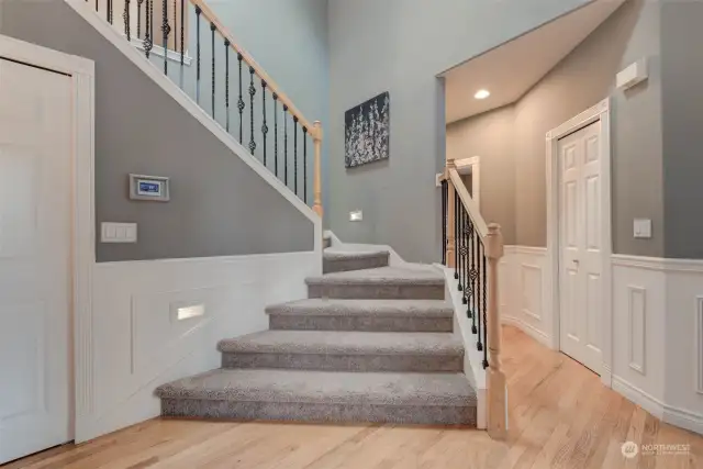 Ascend the iron staircase to find three additional bedrooms and a full bath.