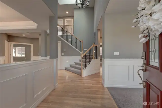 Gorgeous entry sets the tone opening to Formal Living & Dining Room.