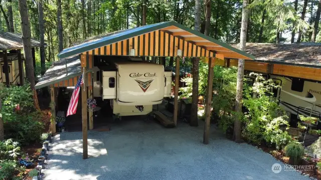 22 FIR RV SITE WITH BEAUTIFUL OUTDOOR KITCHEN TO INCLUDE SS APPLIANCES/BATHROOM WITH LAUNDRY, WALK IN TUB AND TOILET.   ENJOY THE BREATHTAKING VIEWS OF THE FOREST AND SUNSETS