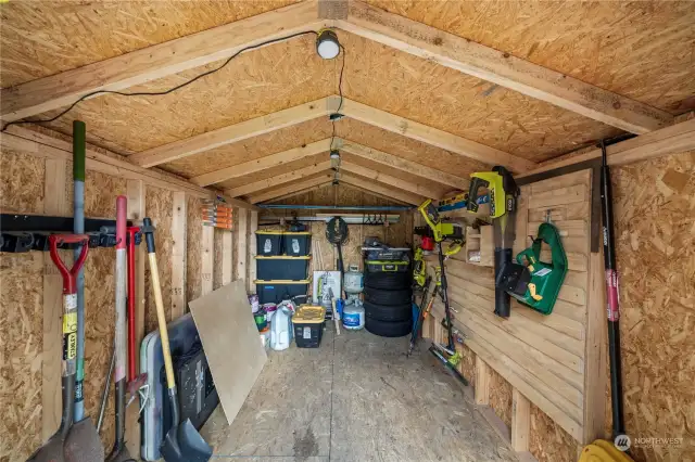 shed in backyard conveys with home.