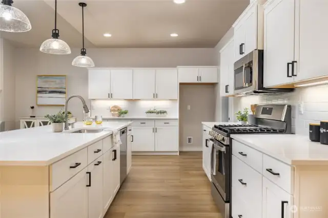 White cabinets with select construction including dove tail drawers and soft close doors.